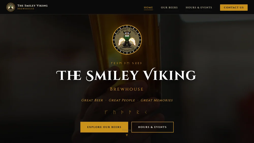 The Smiley Viking Brewhouse homepage: a dark, gold-accented hero with the brewhouse crest over a photo of a poured beer.